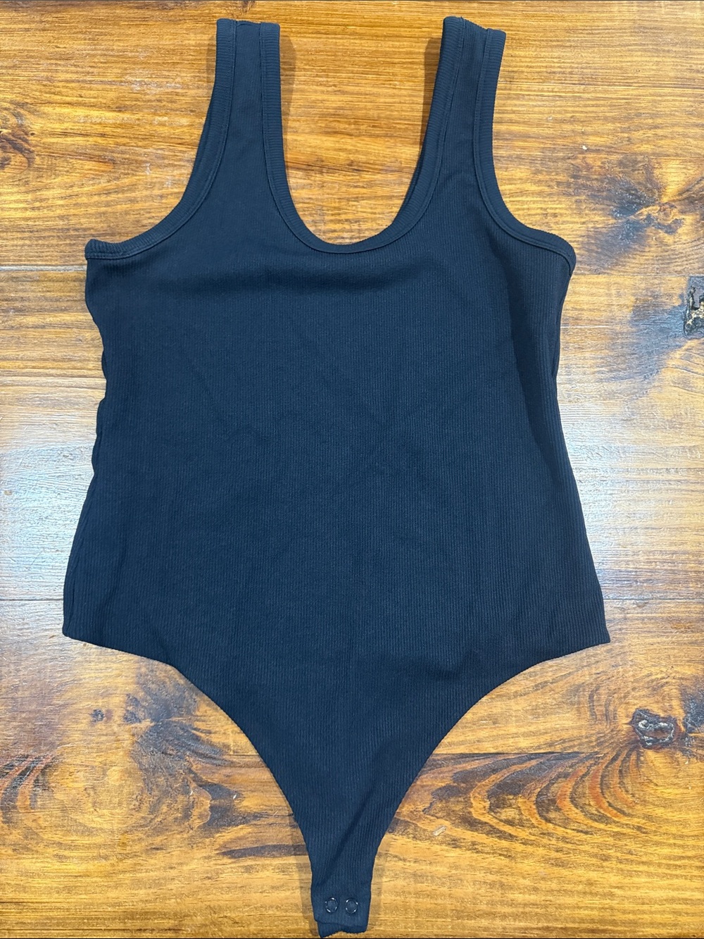 nuuds Black Ribbed One-Piece Bodysuit